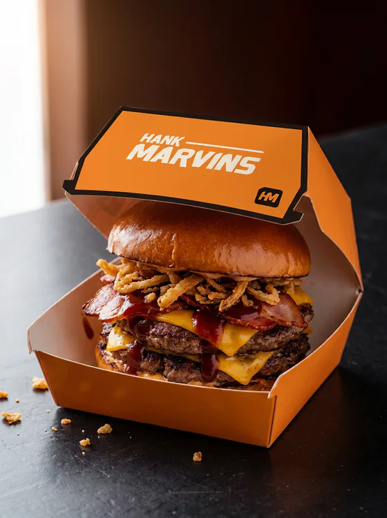 BBQ bacon double, served in Hank Marvins packaging