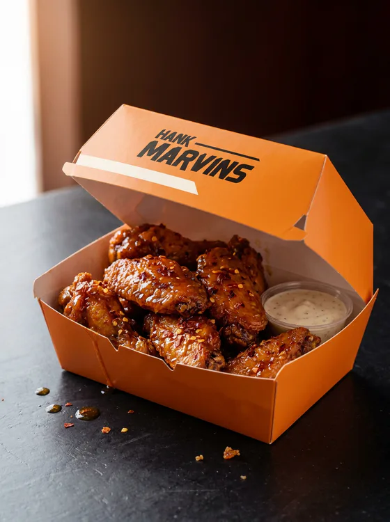 Chicken wings, served in Hank Marvins packaging
